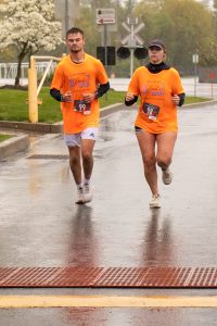 2022 Randi's Race event photo featuring runner #99 and 98.